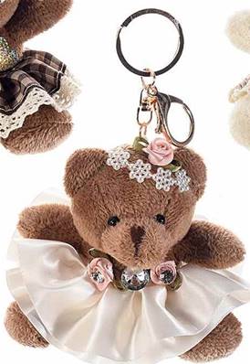 Porte clé à breloque avec ours beige en peluche jupe et cristaux