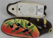 Cigale musicale 15cm olives jaune et rouge