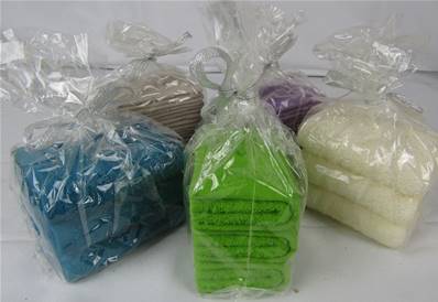 Bougie pile de 3 serviettes de toilette
