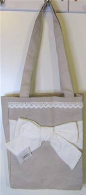 Sac tissu beige gros noeud blanc