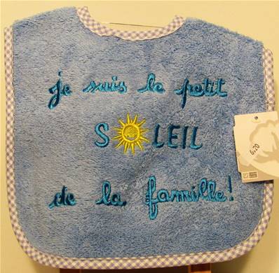Bavoir petit soleil bleu